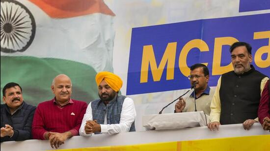 Delhi chief minister and AAP convener Arvind Kejriwal addresses party workers after AAP crossed the majority mark in the MCD polls, at the party headquarters in New Delhi on Wednesday. (PTI)