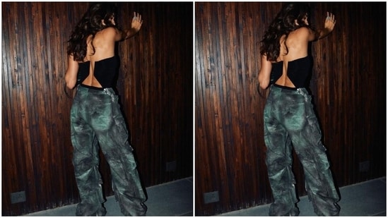 The cargo pants come in a grey and green-hued tie-dye print pattern. It features a mid-rise waistline, a baggy silhouette, floor-grazing hem length, side pockets, side slits, and gathered details.(Instagram)