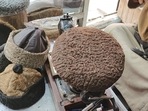 This cap made from the skin of a Karakul lamb is very popular in Kashmir. This fur has a soft, curly texture, a velvety feel, and a glossy sheen.(ANI Photo) This cap made from the skin of a Karakul lamb is very popular in Kashmir. This fur has a soft, curly texture, a velvety feel, and a glossy sheen.(ANI Photo)