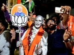 Supporters of BJP celebrate during a felicitation programme organised for Gujarat CM Bhupendrabhai Patel (not pictured) in Ahmedabad on Thursday.(AFP) Supporters of BJP celebrate during a felicitation programme organised for Gujarat CM Bhupendrabhai Patel (not pictured) in Ahmedabad on Thursday.(AFP)