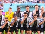 The German football team players covering their mouth for a group photo(Pressebildagentur ULMER/picture alliance) The German football team players covering their mouth for a group photo(Pressebildagentur ULMER/picture alliance)