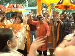 Gujarat election 2022: Screengrab of the video shows BJP workers dancing with joy as they celebrate party's dominance in vote counting.(ANI)