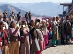 Voters showing their identity cards before casting their votes in the Himachal Pradesh assembly elections. (Deepak Sansta/HT) Voters showing their identity cards before casting their votes in the Himachal Pradesh assembly elections. (Deepak Sansta/HT)