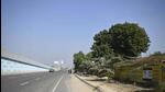 Gurugram, India-November 22: Green cover of trees seen alongside the roads as the CEO of GMDA has directed officials to expedite work on deepening greenbelts to prevent waterlogging in the city during monsoons at Iffco Chowk, near Leisure Valley Park, in Gurugram, India, on Tuesday, 22 November 2022. (Photo by Parveen Kumar/Hindustan Times) (Pic to go with Abhishek Bhel's story) Gurugram, India-November 22: Green cover of trees seen alongside the roads as the CEO of GMDA has directed officials to expedite work on deepening greenbelts to prevent waterlogging in the city during monsoons at Iffco Chowk, near Leisure Valley Park, in Gurugram, India, on Tuesday, 22 November 2022. (Photo by Parveen Kumar/Hindustan Times) (Pic to go with Abhishek Bhel's story)