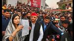 Samajwadi Party candidate Dimple Yadav with her husband and party president Akhilesh Yadav shows the ‘certificate of election’ during a press conference after her victory in Mainpuri by-elections, in Mainpuri, Thursday. (PTI Photo) Samajwadi Party candidate Dimple Yadav with her husband and party president Akhilesh Yadav shows the ‘certificate of election’ during a press conference after her victory in Mainpuri by-elections, in Mainpuri, Thursday. (PTI Photo)