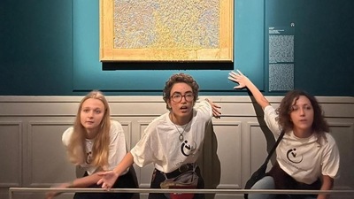Climate activists from Last Generation pose next to "The Sower", an 1888 painting by Dutch artist Vincent Van Gogh, after they threw pea soup at it, in Palazzo Bonaparte, Rome on November 4. (ANSA / AFP) Climate activists from Last Generation pose next to "The Sower", an 1888 painting by Dutch artist Vincent Van Gogh, after they threw pea soup at it, in Palazzo Bonaparte, Rome on November 4. (ANSA / AFP)