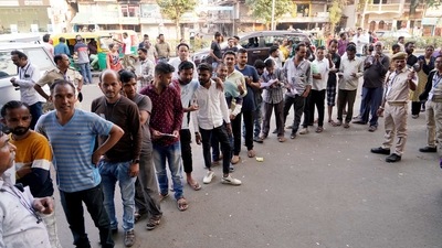 Voters waiting in a queue to cast their vote for the second phase of the Gujarat Assembly Elections, in Ahmedabad. (ANI Photo) Voters waiting in a queue to cast their vote for the second phase of the Gujarat Assembly Elections, in Ahmedabad. (ANI Photo)
