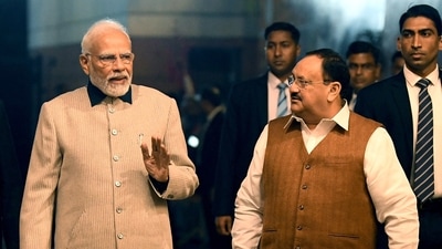 PM Modi with BJP National President JP Nadda arrives at the party headquarters after the party wins in the Gujarat Assembly elections in New Delhi. (ANI)