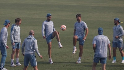 England's players play with football during practice session (REUTERS)
