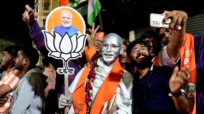 Supporters of BJP celebrate during a felicitation programme organised for Gujarat CM Bhupendrabhai Patel (not pictured) in Ahmedabad on Thursday. (AFP) Supporters of BJP celebrate during a felicitation programme organised for Gujarat CM Bhupendrabhai Patel (not pictured) in Ahmedabad on Thursday. (AFP)