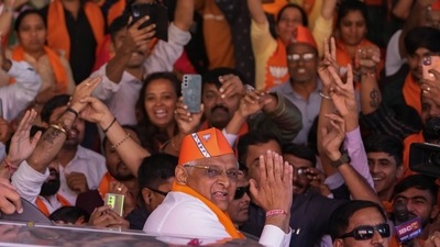 Supporters of the Bharatiya Janata Party (BJP) celebrate as the party recorded a historic win in Gujarat, winning 156 seats in Gujarat Assembly polls. Prime Minister Narendra Modi’s party is all set to keep its 27-year-old control of his home Gujarat state in a record state legislature win. (AP) Supporters of the Bharatiya Janata Party (BJP) celebrate as the party recorded a historic win in Gujarat, winning 156 seats in Gujarat Assembly polls. Prime Minister Narendra Modi’s party is all set to keep its 27-year-old control of his home Gujarat state in a record state legislature win. (AP)