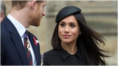 Meghan Markle and Prince Harry are seen. (Reuters)