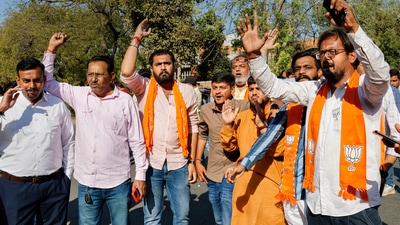 BJP workers celebrate Gujarat Assembly election results in Ahmedabad, Thursday. (PTI)