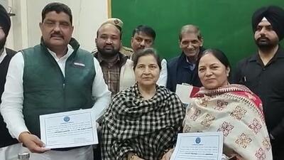 Ambala mayor Shakti Rani Sharma handed over the certificates to both of them after one member each was presented as candidates and the duo was unanimously chosen at a closed-door meeting between members. (HT Photo) Ambala mayor Shakti Rani Sharma handed over the certificates to both of them after one member each was presented as candidates and the duo was unanimously chosen at a closed-door meeting between members. (HT Photo)