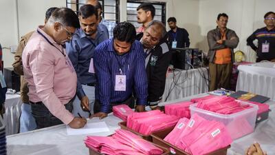 Poll officials at a counting centre in Gujarat on Thursday. (PTI Photo)
