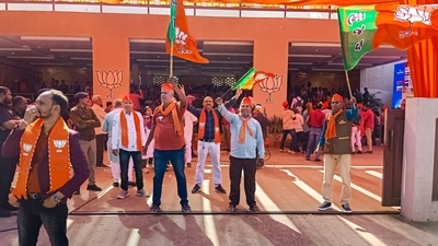 BJP celebrates the party's decisive lead in Gujarat Assembly elections, at the party headquarters in Gandhinagar. (PTI) BJP celebrates the party's decisive lead in Gujarat Assembly elections, at the party headquarters in Gandhinagar. (PTI)