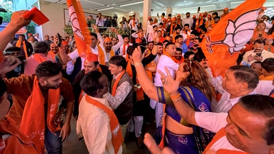 Party workers cherishing as any doubt over a possible three-way contest in Gujarat - dismissed with BJP heading towards historic win. (PTI) Party workers cherishing as any doubt over a possible three-way contest in Gujarat - dismissed with BJP heading towards historic win. (PTI)