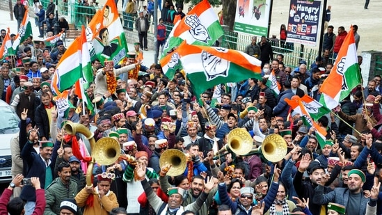 Congress supporters celebrate the victory in the Himachal Pradesh elections in Kullu. (ANI)(HT_PRINT)