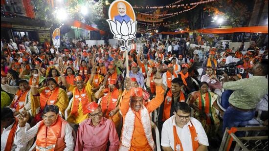 BJP supporters during a rally in Gujarat after the party won the state elections. (PTI)