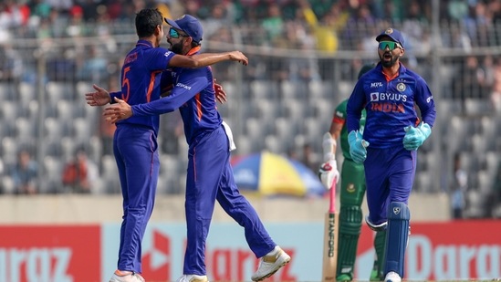 India's Washington Sundar, left, Virat Kohli and K L Rahul, right celebrate the wicket of Bangladesh's Afif Hossain during the second one day international cricket match between Bangladesh and India in Dhaka, Bangladesh, Wednesday, Dec. 7, 2022. (AP Photo/Surjeet Yadav)(AP)