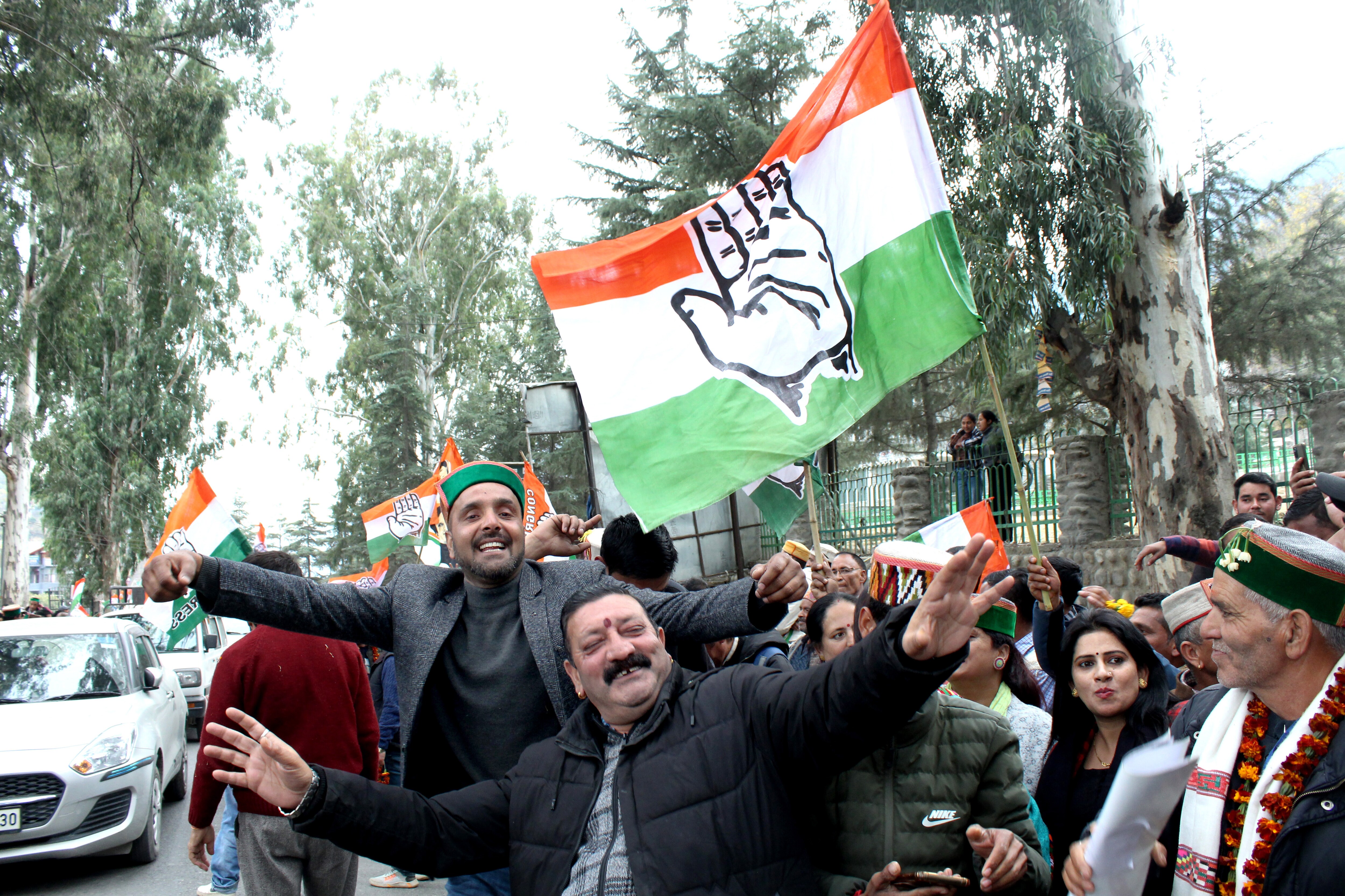 Congress supporters celebrating victory in Himachal Pradesh. (Aqil Khan/Hindustan Times)