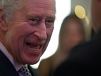 King Charles: Britain's King Charles III talks with volunteers and beneficiaries of local community initiatives in King's Cross.