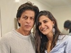 Shah Rukh Khan and Aahana Kumra pose for a photograph together.