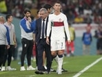 Portugal's Cristiano Ronaldo, center, passes beside his coach Fernando Santos Portugal's Cristiano Ronaldo, center, passes beside his coach Fernando Santos