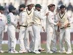 Babar Azam of Pakistan congratulates Abrar Ahmed of Pakistan (2nd from right) on the wicket of Joe Root Babar Azam of Pakistan congratulates Abrar Ahmed of Pakistan (2nd from right) on the wicket of Joe Root