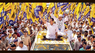 AAP convener Arvind Kejriwal during a roadshow in Rajkot (PTI) AAP convener Arvind Kejriwal during a roadshow in Rajkot (PTI)