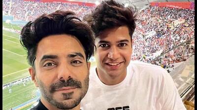 Actor Aparshakti Khurana with a friend attends FIFA World Cup in Qatar. Actor Aparshakti Khurana with a friend attends FIFA World Cup in Qatar.