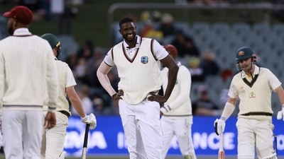 West Indies' Jason Holder, center, smiles after bowling to Australia's Marnus Labuschagne during their cricket test match in Adelaide, Thursday, Nov. 8, 2022. (AP) West Indies' Jason Holder, center, smiles after bowling to Australia's Marnus Labuschagne during their cricket test match in Adelaide, Thursday, Nov. 8, 2022. (AP)