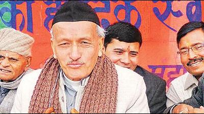BJP leader Bhagat Singh Koshyari with ghughutia garland in Bageshwar. HT BJP leader Bhagat Singh Koshyari with ghughutia garland in Bageshwar. HT
