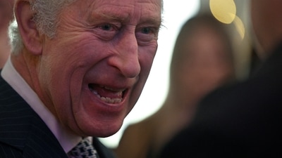 King Charles: Britain's King Charles III talks with volunteers and beneficiaries of local community initiatives in King's Cross. (Reuters)