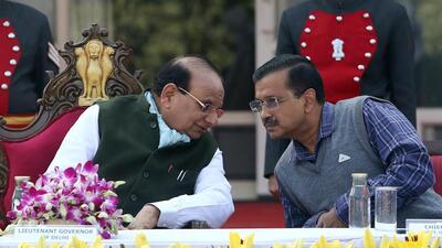 Delhi Lieutenant Governor Vinai Kumar Saxena with Delhi chief minister Arvind Kejriwal during the Armed Forces Flag Day 2022 at Raj Bhawan in New Delhi on Friday. (ANI)