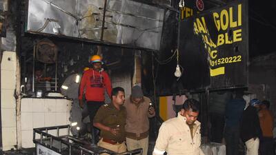 Police personnel at the site of a blaze in Lucknow on Thursday. (HT FILE PHOTO) Police personnel at the site of a blaze in Lucknow on Thursday. (HT FILE PHOTO)
