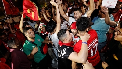 FIFA World Cup 2022: Morocco fans celebrate outside the stadium after the penalty shootout as Morocco progress to the quarter finals. (Reuters)