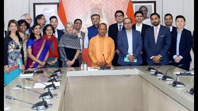 UP chief minister Yogi Adityanath poses for a group photograph with a delegation led by Australia deputy high commissioner to India, Sarah Storey, during an investment conference, in Lucknow on Friday. (ANI Photo) UP chief minister Yogi Adityanath poses for a group photograph with a delegation led by Australia deputy high commissioner to India, Sarah Storey, during an investment conference, in Lucknow on Friday. (ANI Photo)