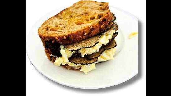 Four Seasons picnic: egg and truffle club sandwich