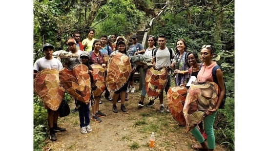 In 2016, artist Tessa Miller organised a school trip to the Sigatoka sand dunes in Fiji, where sea turtles nest. There, students wrote affirmations on turtle shells made of cloth, committing to protect the region’s biodiversity. The event was organised as part of Remembrance Day for Lost Species, observed since 2011, with small, independent events held around the world around November 30. The idea for such a Day was conceived by a Brighton theatre group; it coincides roughly with the largely ineffective UN COP talks held each year.(Image Courtesy: Lost Species Day)