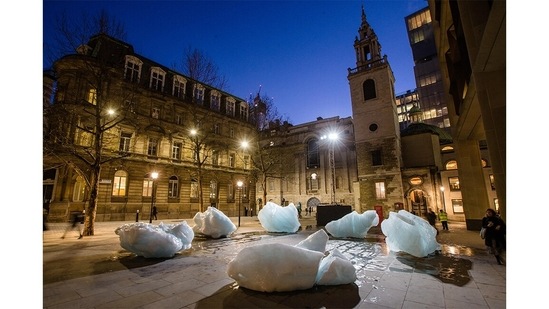 Blocks of glacial ice from Greenland stand in a public square in London. They were transported there for an art project by Danish-Icelandic artist Olafur Eliasson, in 2018.(Charlie Forgham-Bailey / Studio Olafur Eliasson)