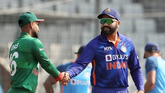 India captain Rohit Sharma and Bangladesh skipper Litton Das shake hands during the toss for the 2nd ODI, at Shere Bangla National Stadium, in Dhaka on Wednesday. (ANI Photo)