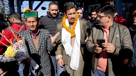 Congress MLA from Shimla (Rural) Vikramaditya Singh being welcomed by the party supporters during his visit to Himachal Pradesh party chief Pratibha Singh's residence after the party wins the State Assembly Elections, in Shimla on Friday. (ANI Photo)(Pradeep Kumar )