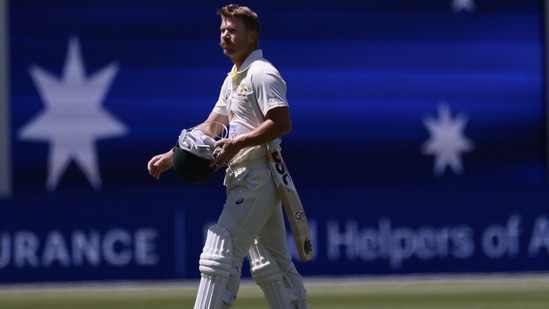 Australia's David Warner walks off after losing his wicket(AP)