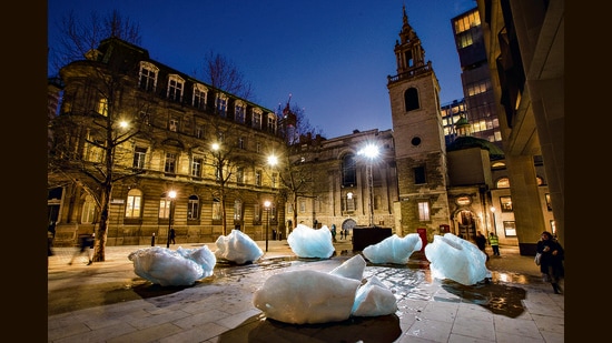 Blocks of glacial ice from Greenland lie scattered across a public square in London, in a 2018 installation by Danish-Icelandic artist Olafur Eliasson. They were deposited on December 11, and publicly melted away over the following week. (Charlie Forgham-Bailey / Studio Olafur Eliasson) Blocks of glacial ice from Greenland lie scattered across a public square in London, in a 2018 installation by Danish-Icelandic artist Olafur Eliasson. They were deposited on December 11, and publicly melted away over the following week. (Charlie Forgham-Bailey / Studio Olafur Eliasson)