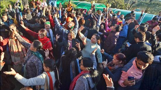 Congress supporters celebrate the party's victory in the Himachal Pradesh assembly elections, in Shimla on Thursday. (ANI)