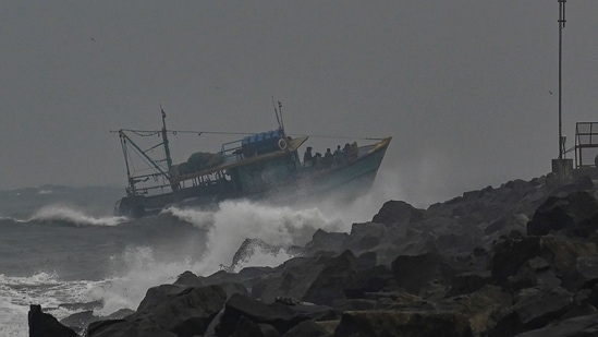 Three districts of Tamil Nadu were given a red alert as cyclone Mandous maintains its intensity of 'Severe Cyclonic Storm' till early morning hours on Friday. The National Disaster Response Force team were kept on standby in Chennai, informed officials on Friday.(AFP)