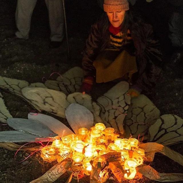 Amid candles and handwritten posts, participants share stories and raise awareness at a 2017 ceremony held in honour of extinct and endangered pollinators. (Courtesy Lost Species Day) Amid candles and handwritten posts, participants share stories and raise awareness at a 2017 ceremony held in honour of extinct and endangered pollinators. (Courtesy Lost Species Day)