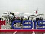 Footage broadcast Friday by CCTV showed the jet bearing the China Eastern insignia standing on a rainswept airfield.