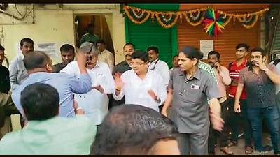 A video about the incident showed a man suddenly come in front of Patil and throw ink at his face. (HT PHOTO) A video about the incident showed a man suddenly come in front of Patil and throw ink at his face. (HT PHOTO)